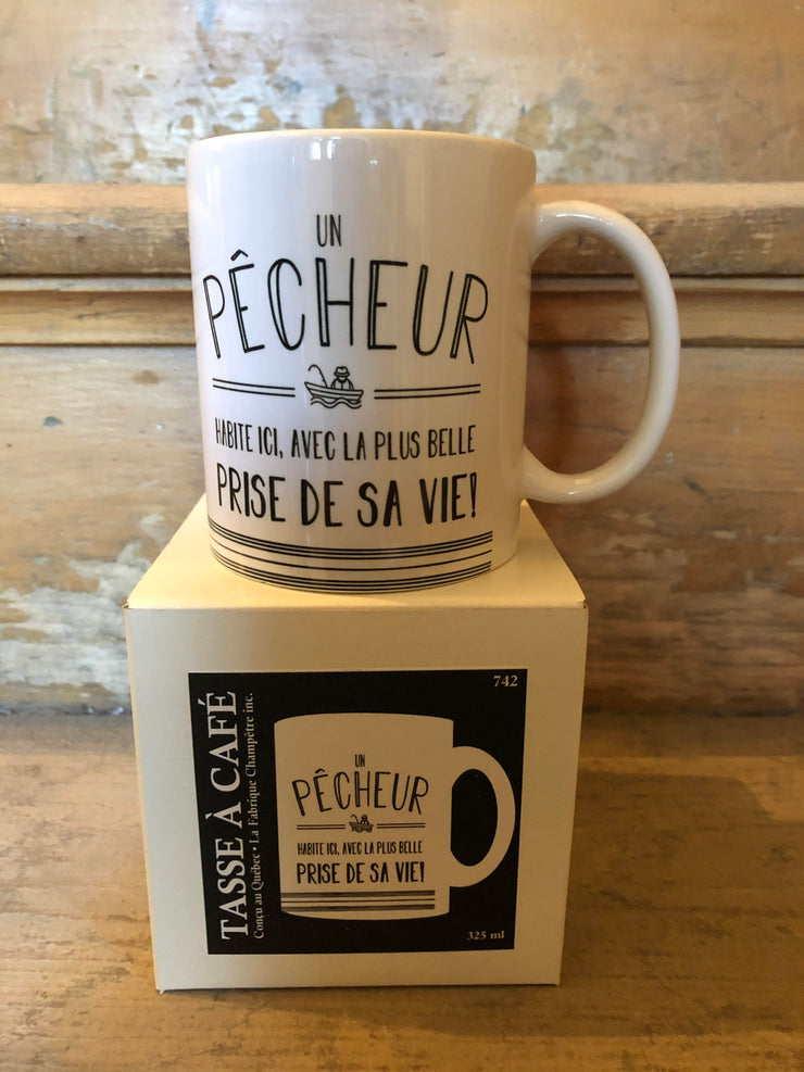 Tasse Un Pêcheur Habite Ici